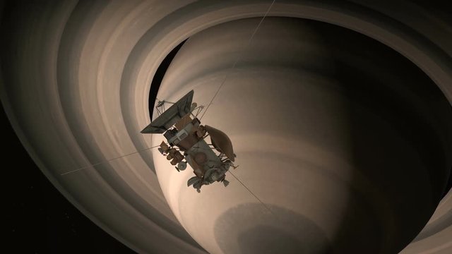 Satellite Cassini is approaching Saturn. Cassini Huygens is an unmanned spacecraft sent to the planet Saturn. CG animation. Elements of this video furnished by NASA.
