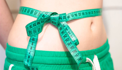 Measure the waist with a centimeter, a diet, a healthy lifestyle.