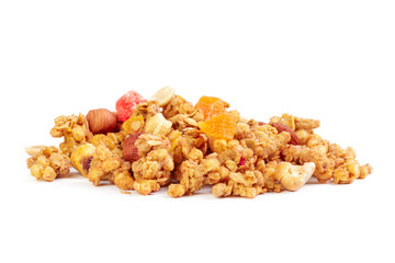 Granola with dried fruits isolated on white