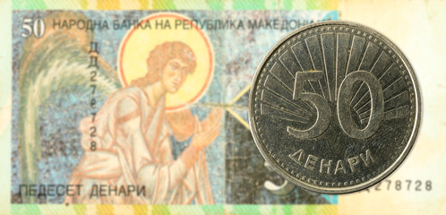 50 macedonian denar coin against 50 macedonian denar bank note
