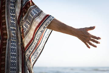 Senior woman reaching out her hand