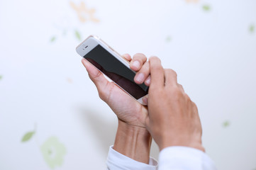 Hands and cell phones. Communication device
