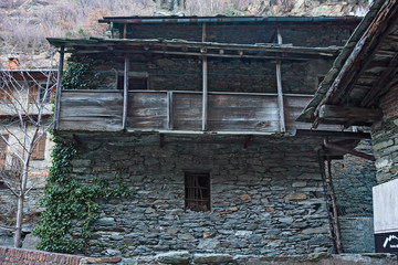 Ancient typical dwelling of, stones and wood of the Alps.