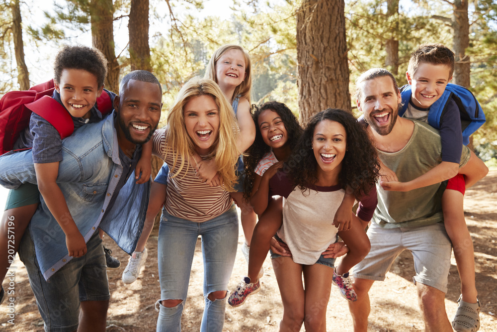 Wall mural Portrait Of Family With Friends On Hiking Adventure In Forest