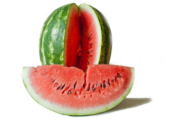 cut red watermelon with a separate slice on a white background