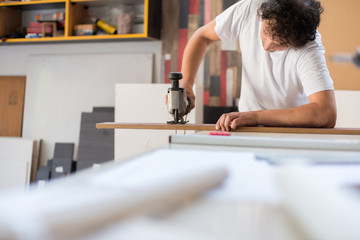 Cutting the plywood with Jigsaw