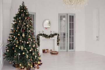 Christmas tree in a bright decorated room