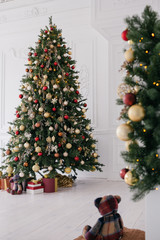 Christmas tree in a bright decorated room