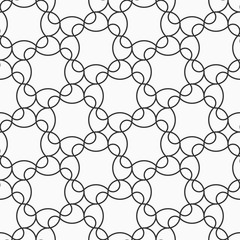 Abstract seamless pattern with regularly repeating geometrical shapes.
