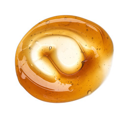 Golden smears of face cream or honey