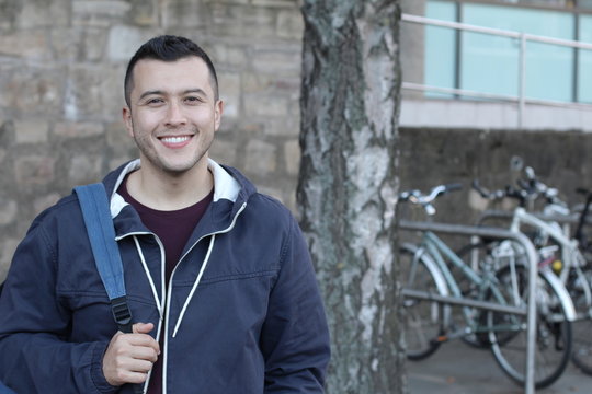 Smiley student on campus isolated 