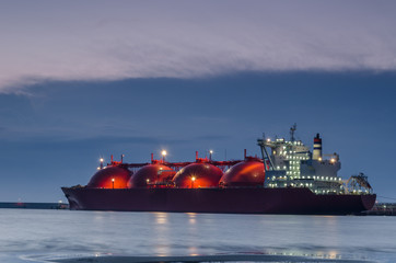 LNG TANKER - Sunrise at the gas terminal and tanker in Swinoujscie