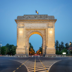 Bucharest, The Triumphal Arch (Arcul de Triumf) at dusk