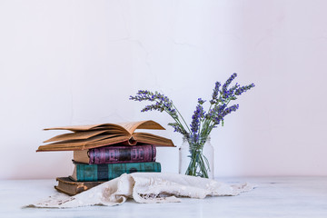 Plakat Izmir/Turkey - May 31, 2018: Old books and lavender
