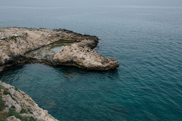 Old vintage houses on the rocks of the coast in Polignano a Mare apulia Italy