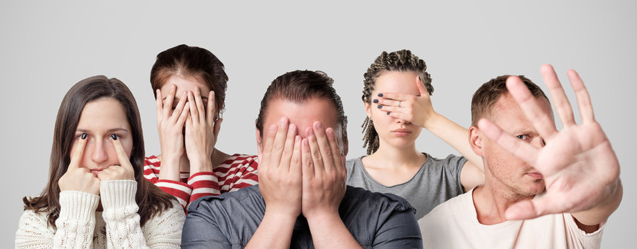 Concept Of Shame Or Guilt. Group Of People Closing Their Face Or Eyes With Hands