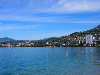 Fototapeta na wymiar Wonderful view on Lake Geneva landscape and swiss promenade in european city of Montreux at alpine riviera, SWITZERLAND