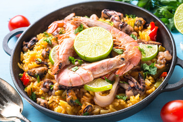 Seafood paella with shrimps, mussel and octopus.