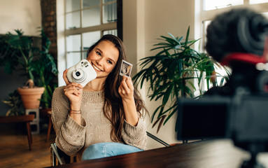 Woman blogger recording her content on camera