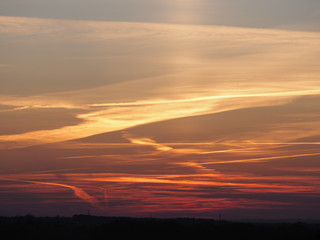 Wonderful panoramic scenery of colored sky at sun set with clouds formation seen from european Bielsko-Biala city Poland