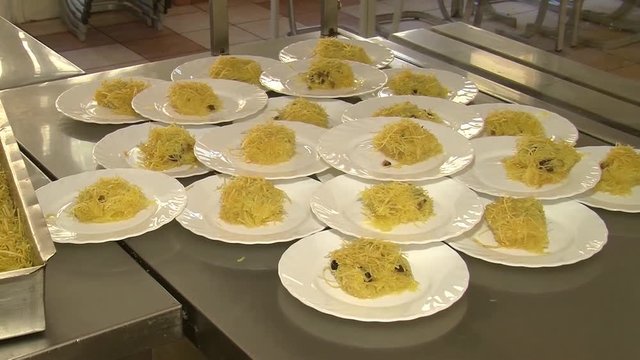 Turkish dessert kadayif kunefe with pistachios.Noodles pear dessert in a glass pear ice cream. Vegetarian concept. Kadaif - All About the Greek and Middle Eastern Pastry