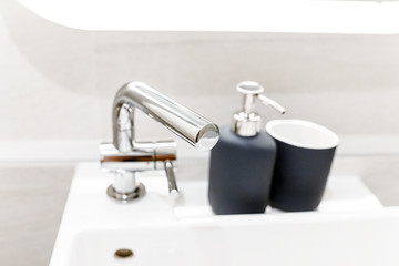 Bathroom and wc modern interior with sink and faucet