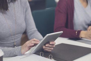 Woman Holding Tablet 