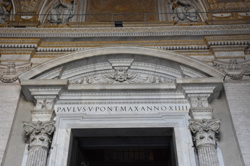 Rome. Atrium Exterior  of the Basilica of San Pietro. Details of an entrance to the basilica