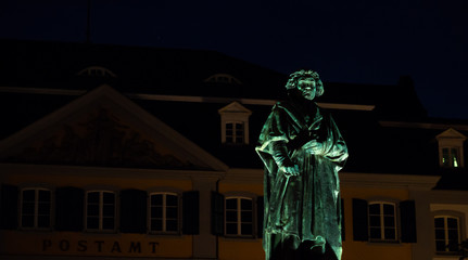 Portrait of a Beethoven statue at night