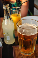 glasses with beer, juice and lemonade