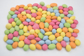 Colorful chocolate candies isolated on white background