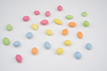 Colorful candy scattered on the table
