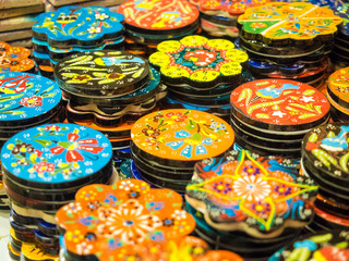 Handmade colorful Turkish ceramic plates on market.