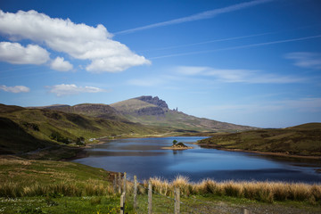Fototapeta na wymiar Scottish famous mountain and lake view of The Old Man of Storr in Skye