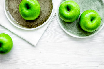 ripe green apples white table background top view space for text