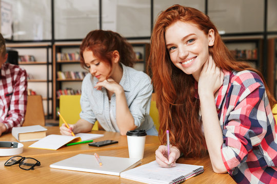 Group of young teenagers doing homework