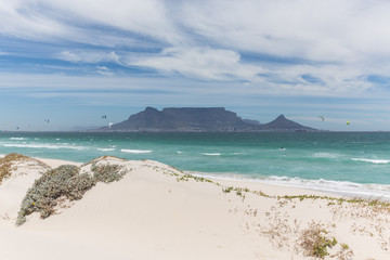 Fototapeta na wymiar View of Table Mountain from Blouberg in Cape Town with wind surfers