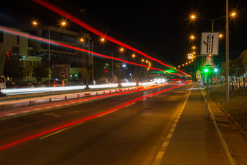 Fototapeta na wymiar City night with the car traffic of the blurred light in Sveti Vlas, Bulgaria