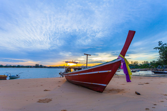 sunrise above Sarasin bridge fishing boats are parking on the beach
