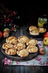 Slices of fresh apples baked in dough. With sesame seeds