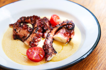 Mediterranean Octopus with vegetables and potatoes