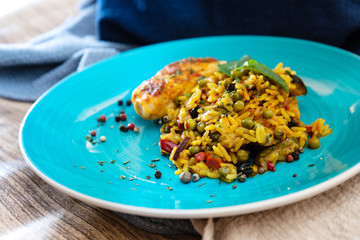 Andalusian fish, saffron rice with vegetables