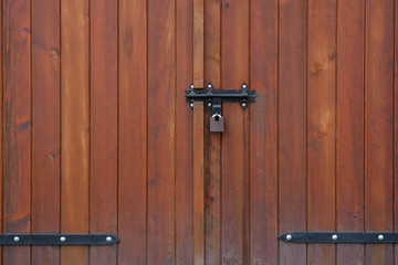 Wooden fence texture or gate or wall with lock