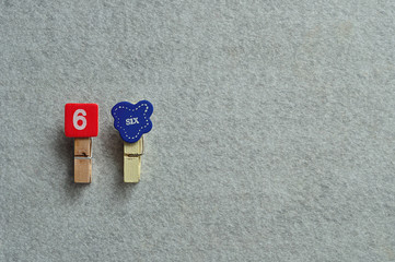The figure six with the word six