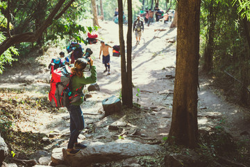 Asian woman travel nature. Travel relax. Photography tourists. Travel up the mountain