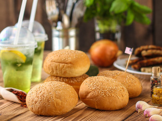 burgers with meat, tomato and lettuce leaves  - fast food (sandwich) - cuisine.  Food background