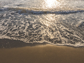 mare schiuma tramonto