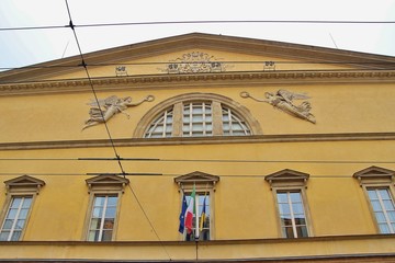 Detail of the facade of the theatre Teatro Regio di Parma, opened in 1821. Parma, Italy, South Europe.