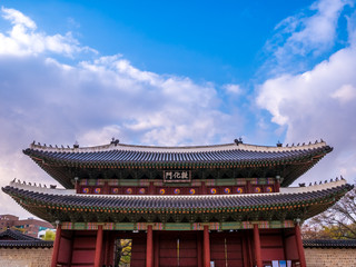  The main gate at Changdeokgung Palace blue sky is a famous tourist attraction in Seoul, South Korea.