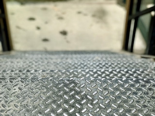 Fototapeta premium Steps of iron stairs, top view 